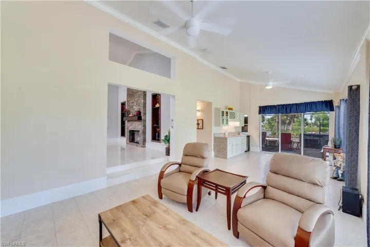 Family room w/sliders to oversized lanai/pool area.