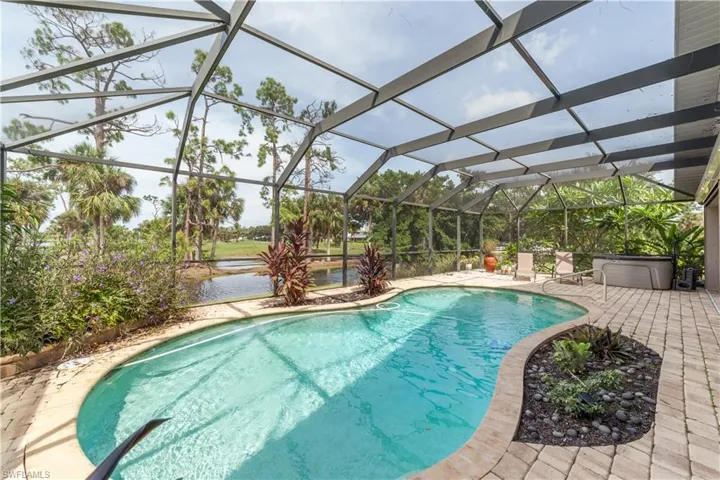 View of pool featuring a lanai and a patio area