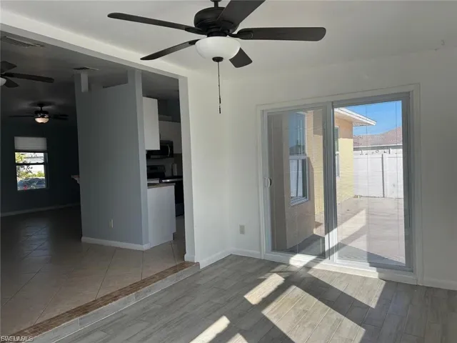 Spare room featuring a ceiling fan and wood finished floors