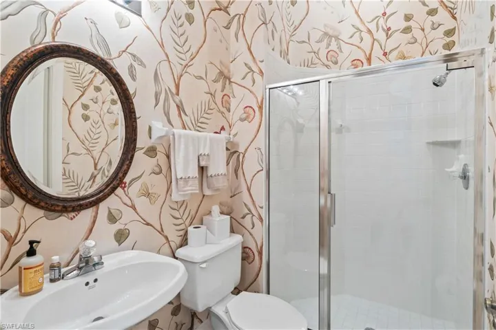 Guest bathroom with stand-up shower right off the den.