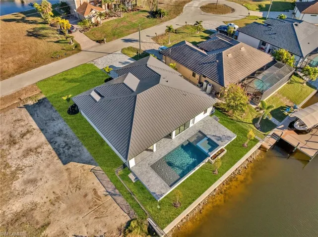 Aerial view of a large body of water and a pool