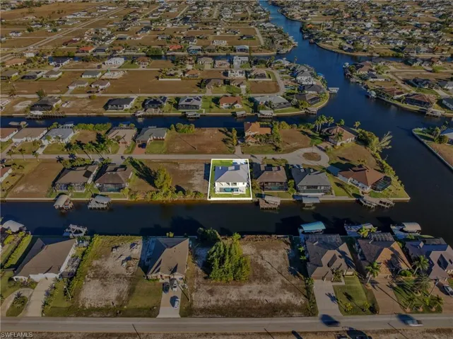 View of property location featuring nearby suburban area and a large body of water