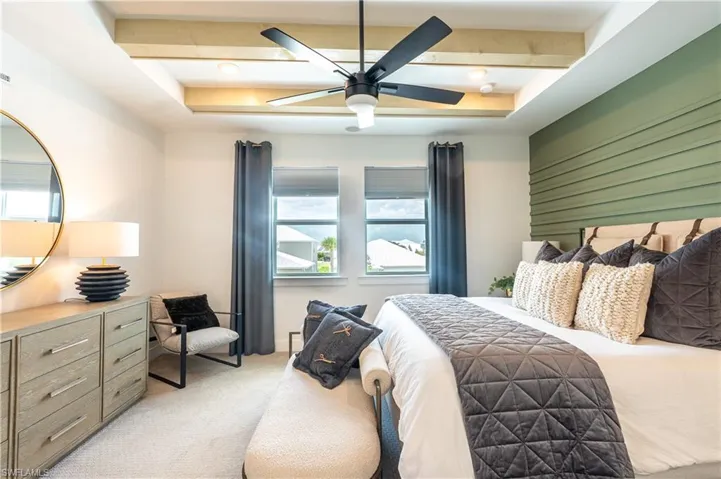 Bedroom featuring a coffered ceiling with wood beams, a ceiling fan, and recessed lighting