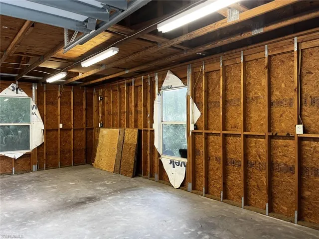 View of detached garage/workshop with electricity.