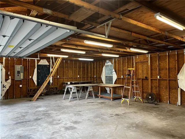 Garage featuring electric panel