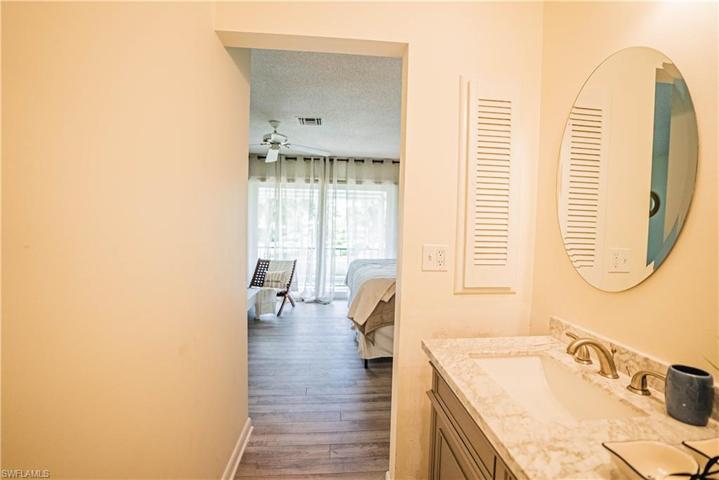 Primary Bath into Primary Bedroom