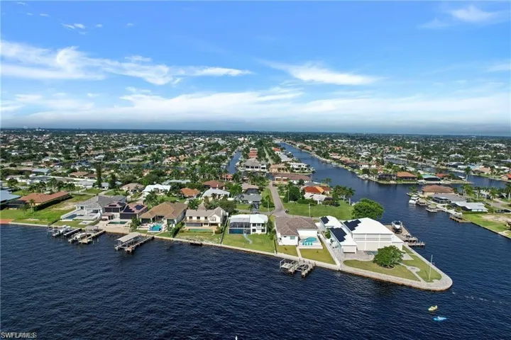 Aerial view of residential area with a nearby body of water