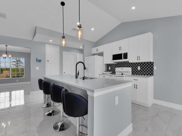 Kitchen w/ Long Breakfast Bar