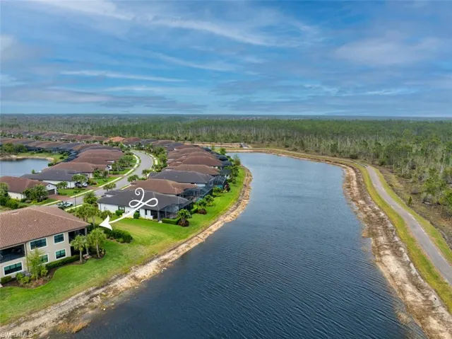Bird's eye view with a residential view and a water view