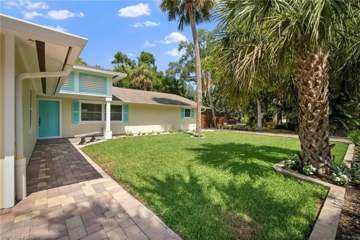 View of yard with a patio area
