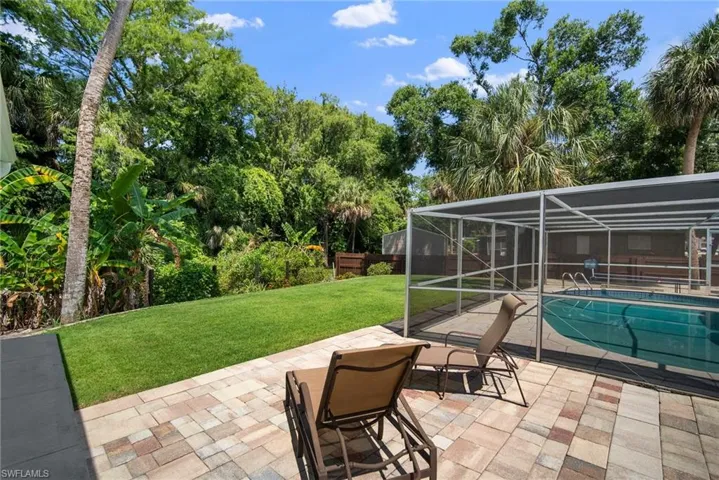View of patio / terrace with a lanai