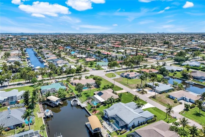 Aerial view of residential area with a nearby body of water
