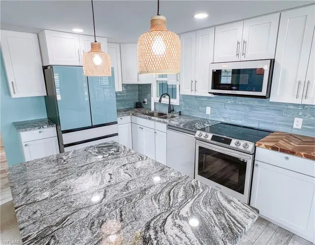 Open concept living, dining and kitchen