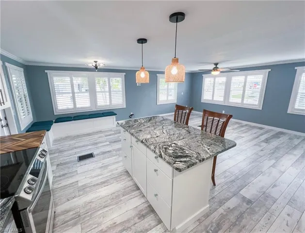 Open concept living, dining and kitchen