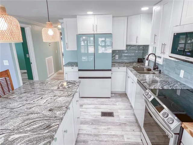 Open concept living, dining and kitchen