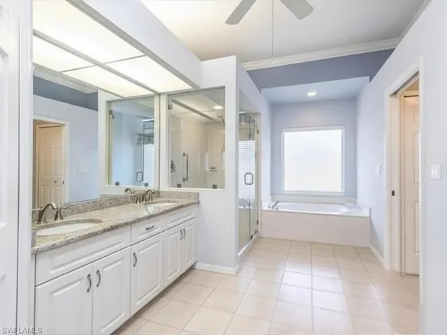 Master Bathroom Suite with double sinks and separate toilet room