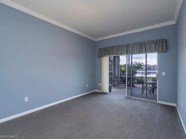 Master Suite with 2 walk in closets and it over looks the sunroom with a view
