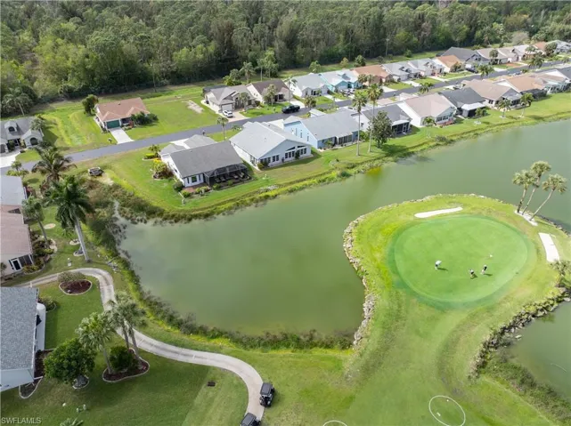 Aerial view of residential area with a large body of water