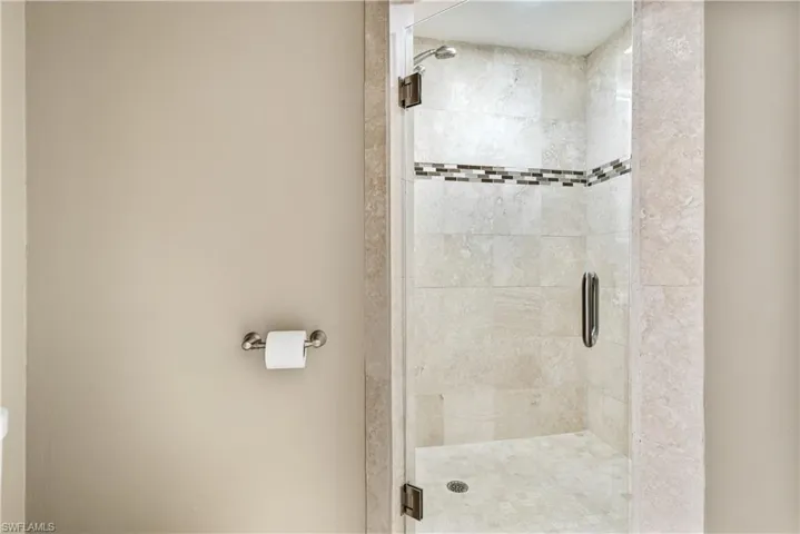 Full bath featuring a stall shower