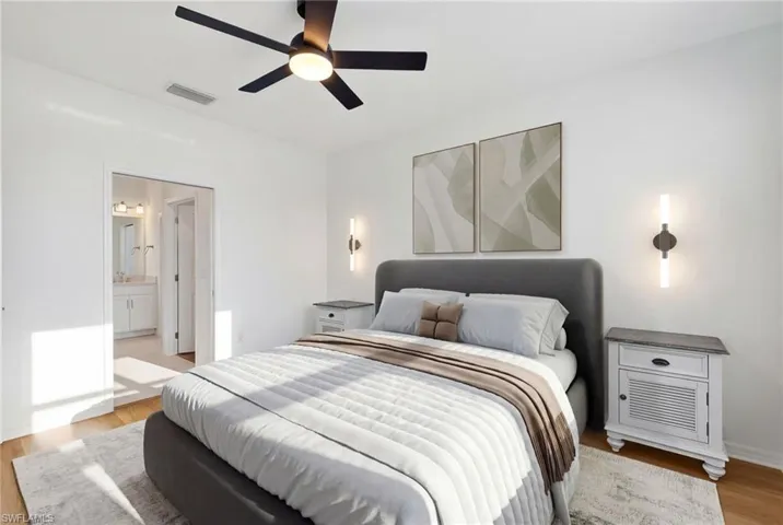 Bedroom with light wood-type flooring and ceiling fan