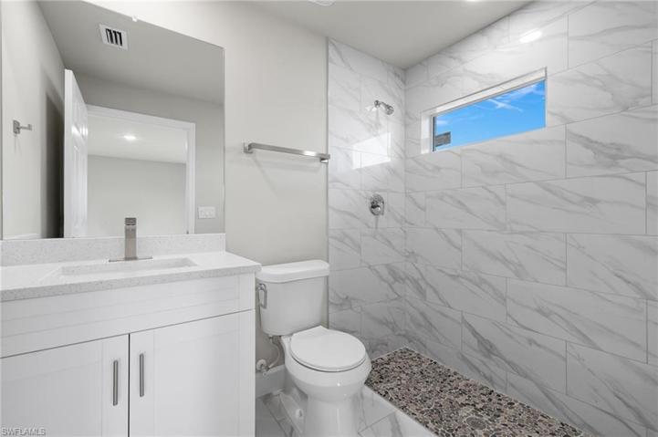2209  KENNETH S AVE, LEHIGH ACRES, FL 33973