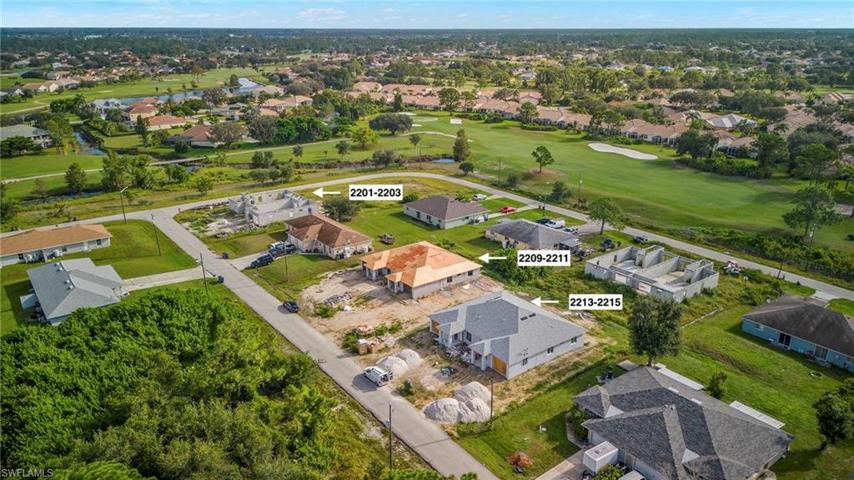Aerial picture of all 4 duplexes - 2 corner and 2 standard models