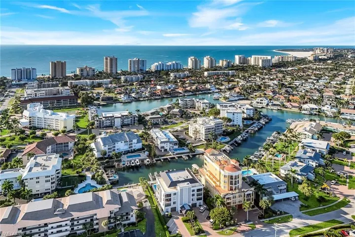 View of urban area featuring a nearby body of water