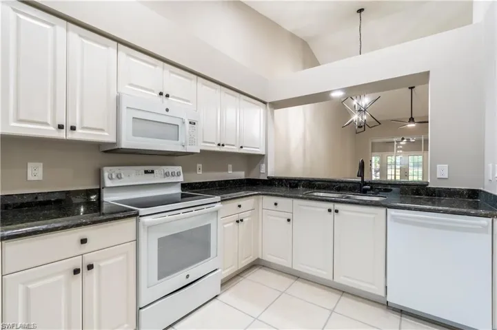 Open Kitchen with white Appliances