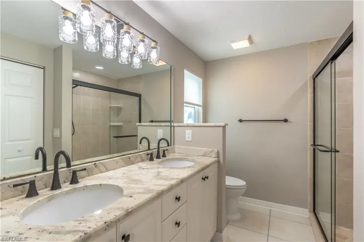 Remodeled and updated Master Bedroom with Dual Sinks and Walk-in Shower