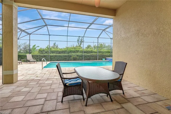 Covered lanai with electric roll down shades