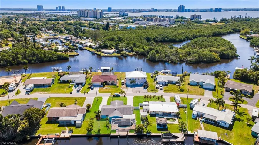 Drone / aerial view featuring a residential view and a water view