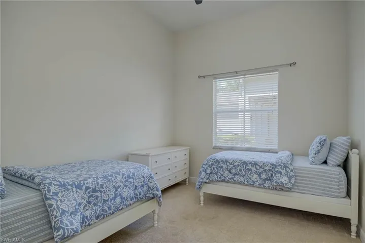 Bedroom featuring carpet floors and a ceiling fan