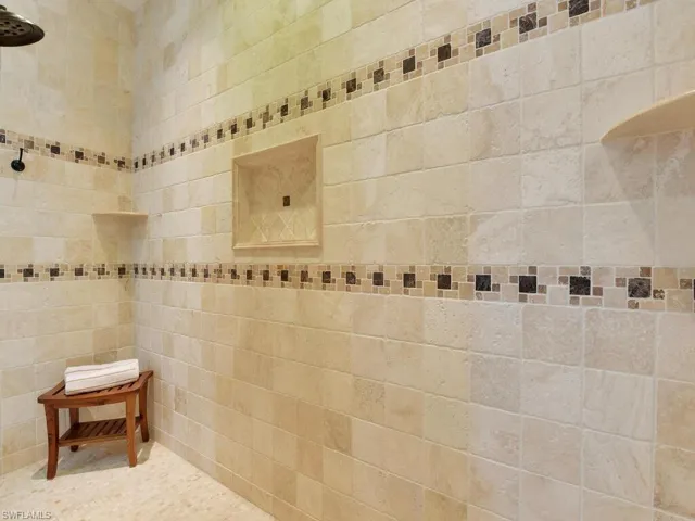 Bathroom with a tile shower