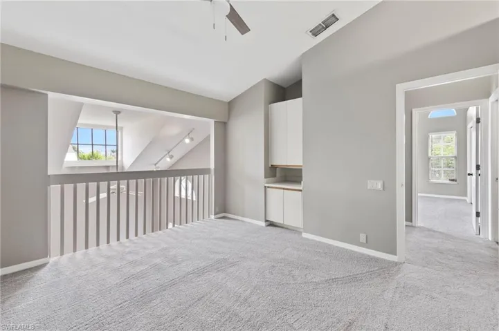 Loft bedroom with storage, new ceiling fan/lighting.