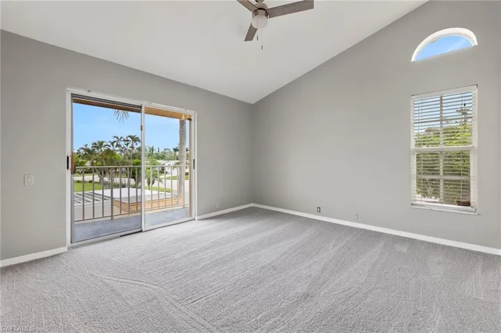 Second floor Guest Bedroom.  New carpet, fresh paint, new ceiling fan/lighting-high ceiling.