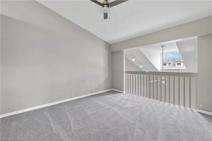 Loft bedroom with new carpet, fresh paint.
