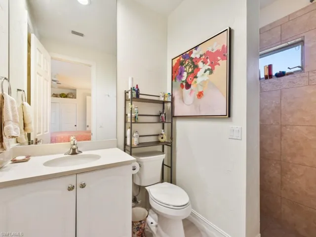 Bathroom with toilet and vanity