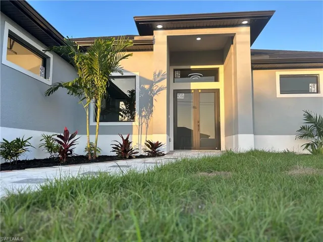 Entrance to property featuring french doors