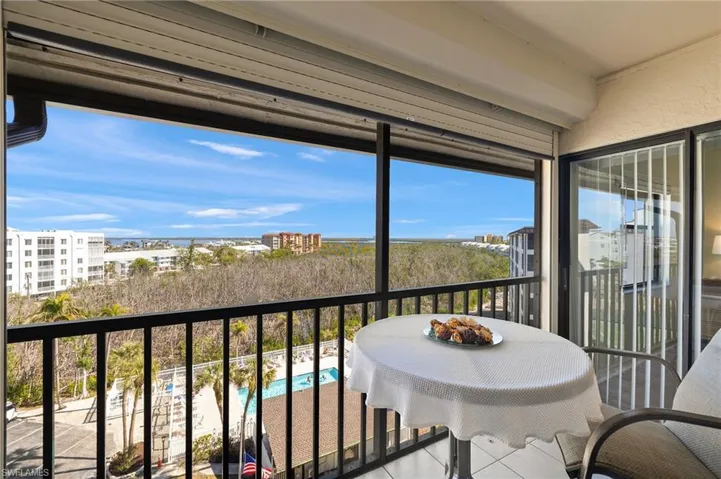 Enjoy serene views of the horizon from your lanai with storm protection.