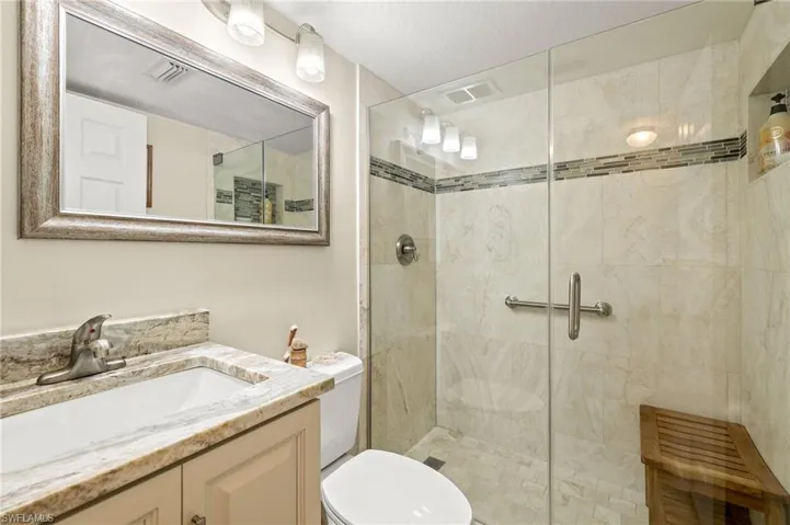 Guest Updated Bathroom  W/ Walk-in Shower and Glass Shower Door-Virtually Enhanced Photo