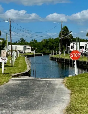 Water view featuring a boat ramp and a boat dock