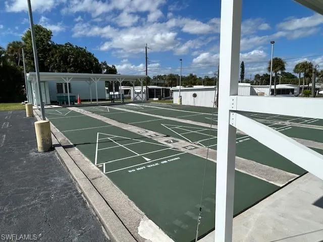 View of home's community with shuffleboard