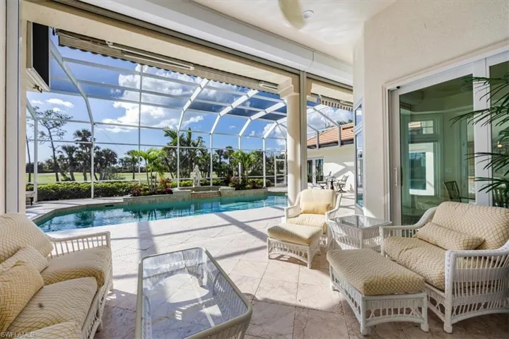 View of pool with a patio, a lanai, and outdoor lounge area