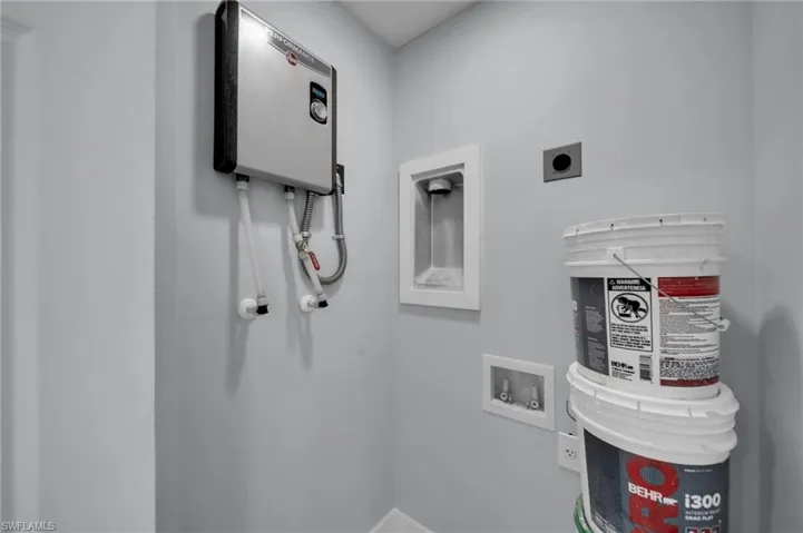 Laundry room with laundry area, electric dryer hookup, and hookup for a washing machine