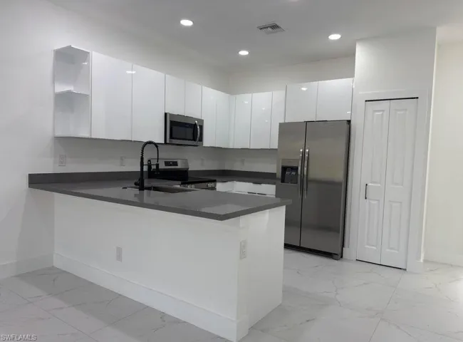 406 Chalet Ave S, Lehigh Acres, Florida 33974