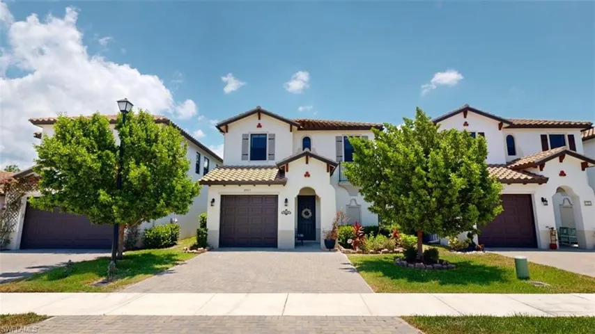 Mediterranean / spanish-style home featuring a garage