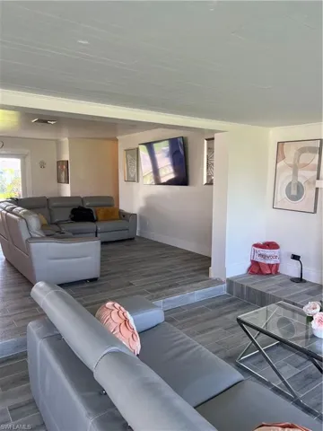 Living area featuring wood finish floors and plenty of natural light