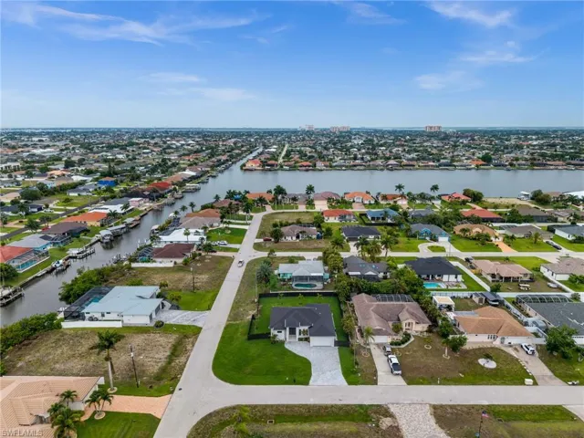 Aerial perspective showcasing a residential community with numerous properties