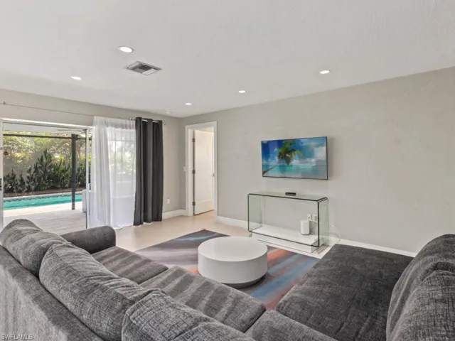Living room featuring recessed lighting and wood finished floors