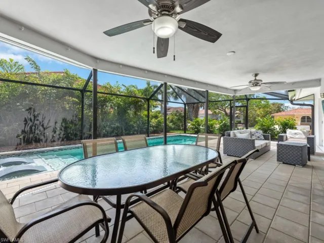 Sunroom / solarium with plenty of natural light and a jacuzzi